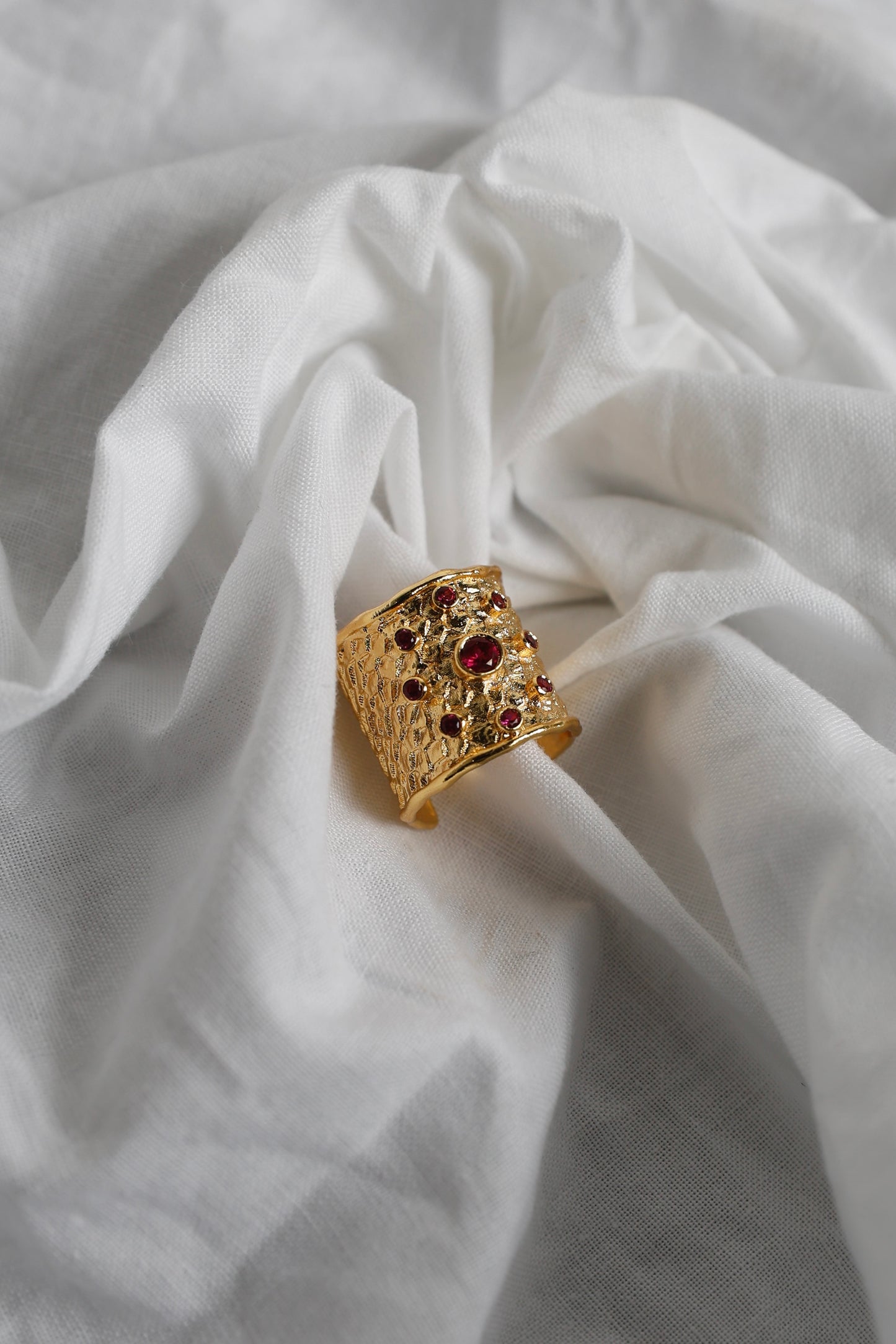 ANILLO SOL MOTAS FUCSIA